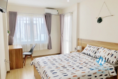 Bright and Fully Furnished Two Bedrooms Apartment for rent in Van Cao st, Ba Dinh district.